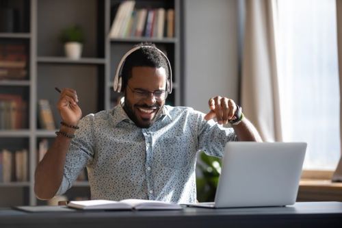 Man happy with his business electricity tariff | business electricity.